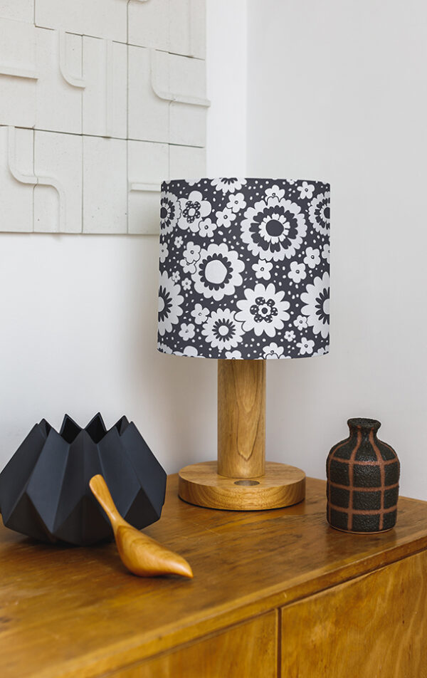 Patterned lampshade on sideboard