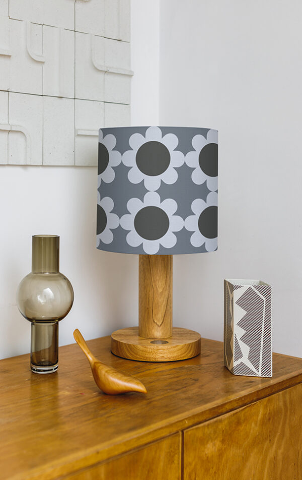 Patterned lampshade on sideboard